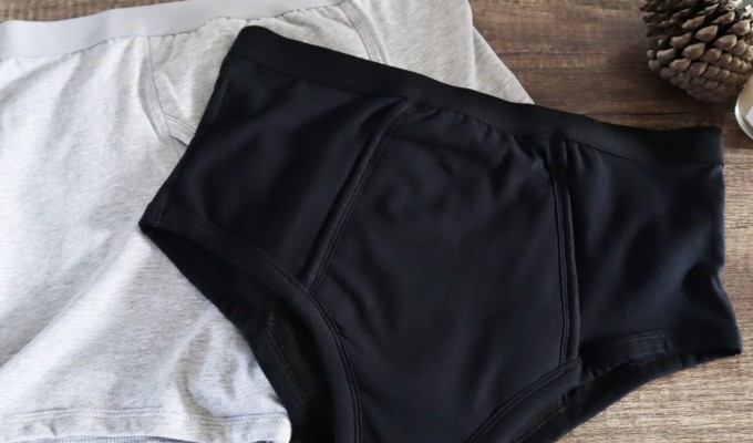 Conni Men's Underwear laying on chest of draws