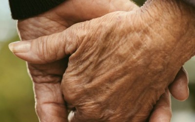 Elderly Couple holding hands